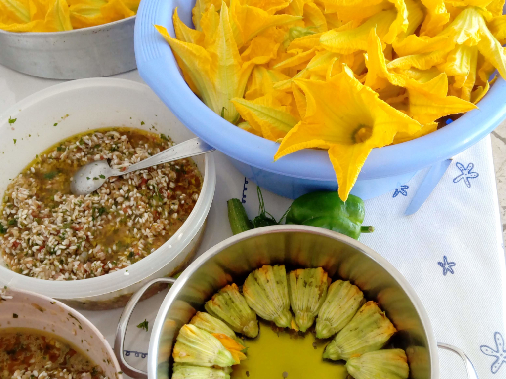 Preparing dolmades with chukini flowers