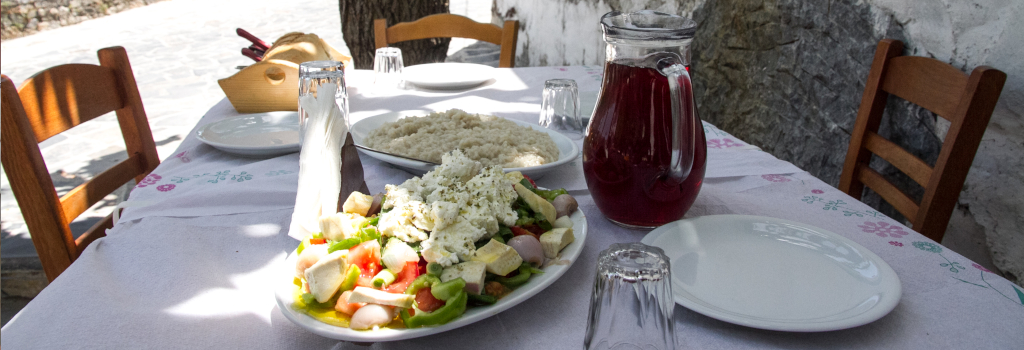 A table served with local delicacies and wine